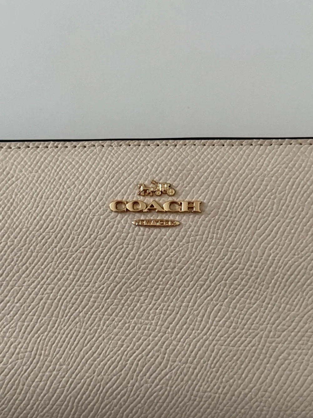 COACH Slim Pebbled Leather Wallet in White with Gold Logo